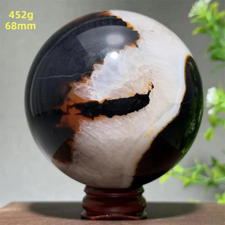 Polished Black Banded Agate Sphere (452g, 68mm) with dramatic black, charcoal, and white striations on a stand.