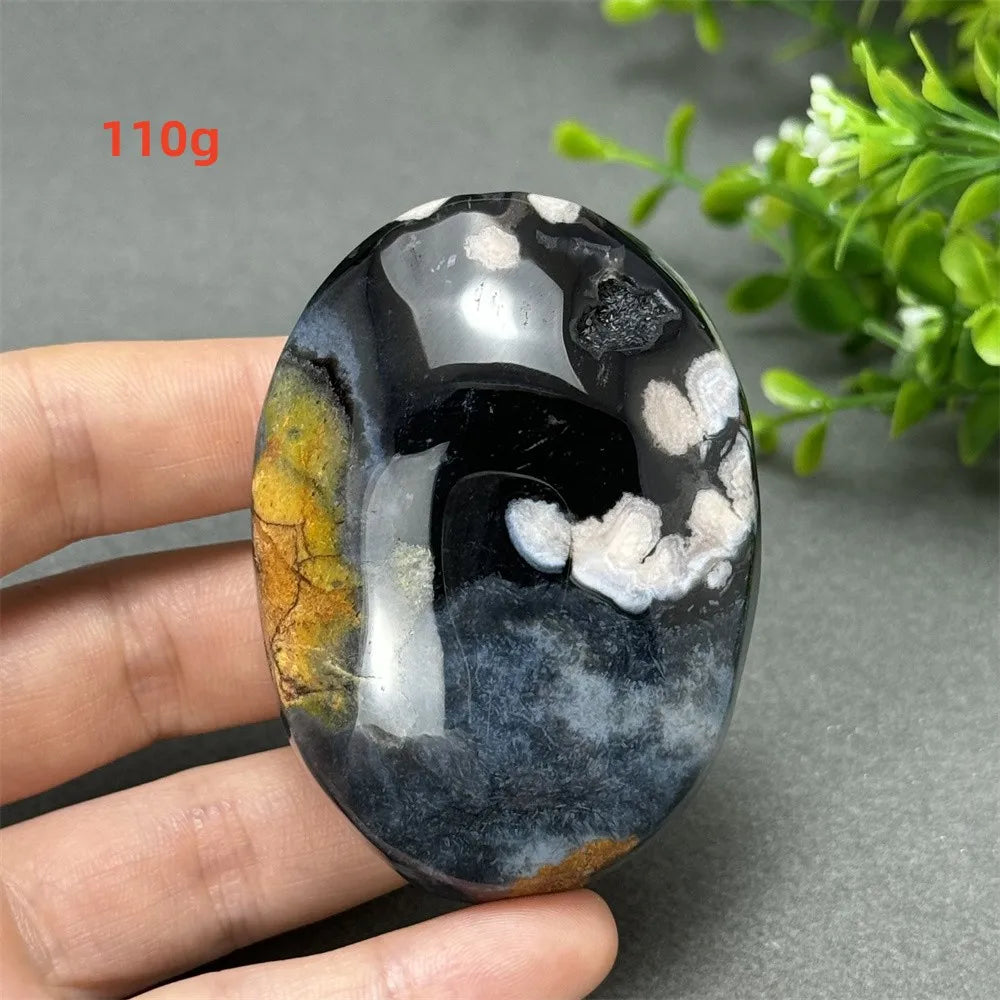 110g Black Cherry Blossom Agate palm stone with charcoal base and cream floral dendrites for grounding Root Chakra energy.
