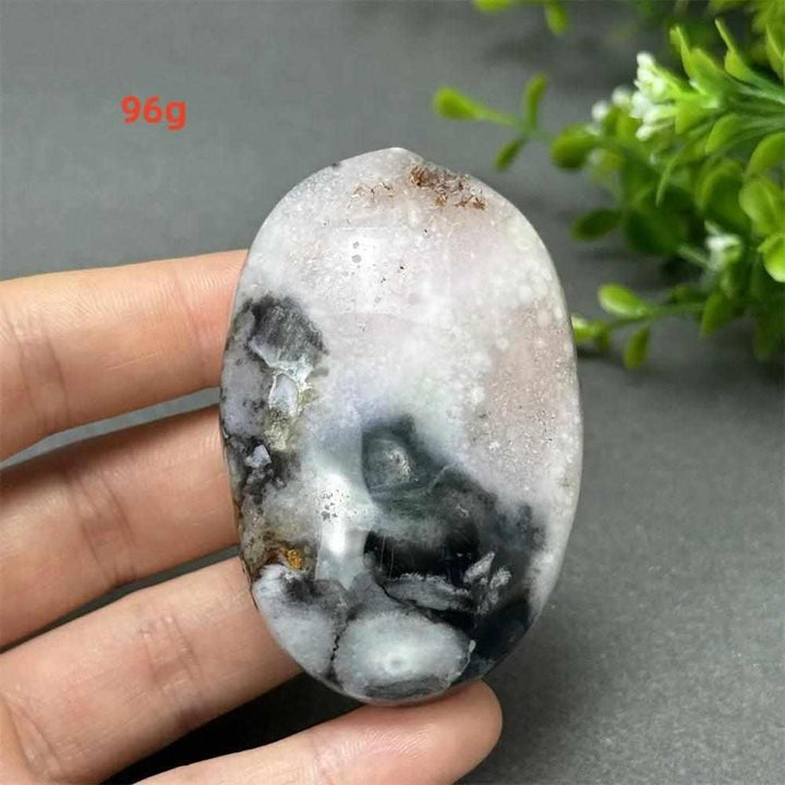 96g Black Cherry Blossom Agate palm stone with charcoal base and blush floral dendrites for grounding Root Chakra energy.