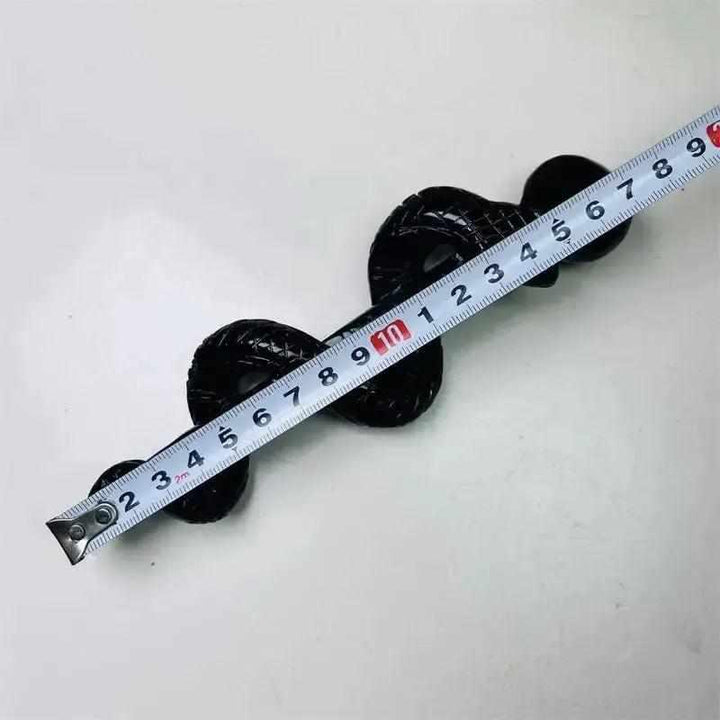 Black obsidian crystal snake staff carving, a glossy, protective healing symbol measuring approximately 12 centimeters.
