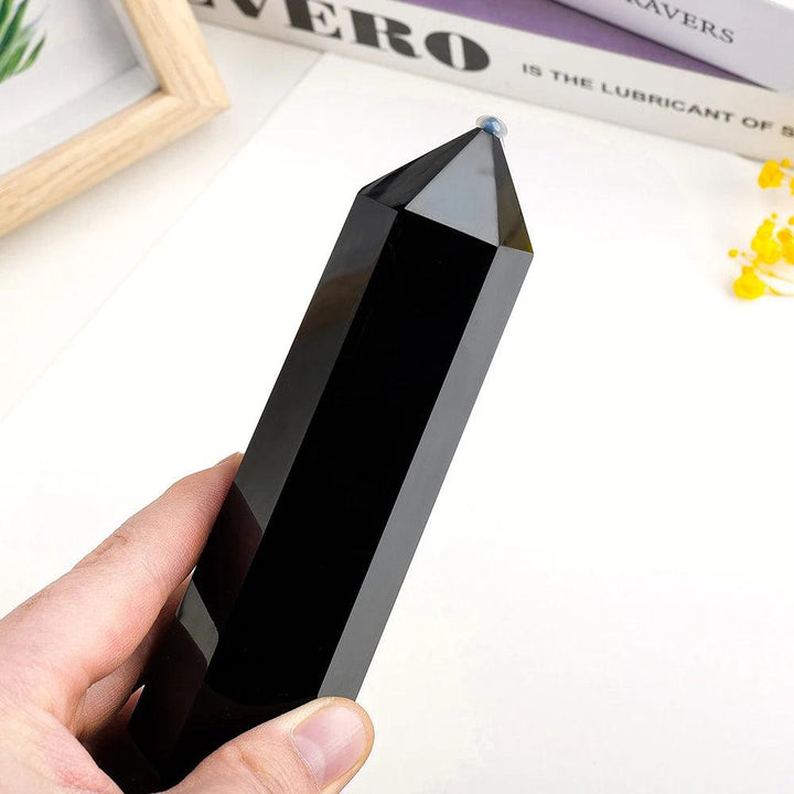 XL Black Obsidian double point wand, a polished volcanic glass crystal for grounding, protection, and energy clearing.