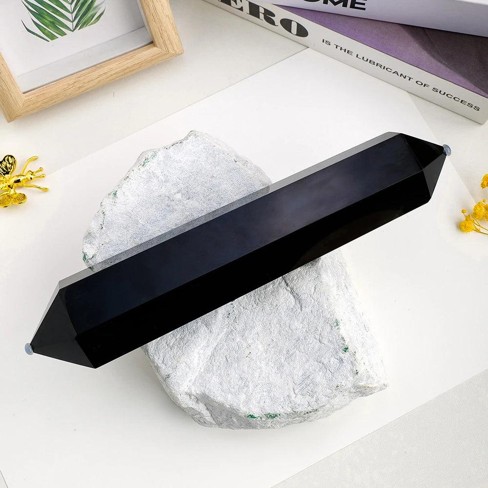 XL Black Obsidian double point wand for grounding and protection, featuring a polished, sleek volcanic glass design.