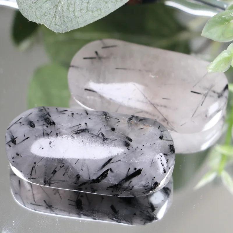 Polished Natural Black Rutilated Palm Stone with unique needle-like inclusions for grounding and home decor.