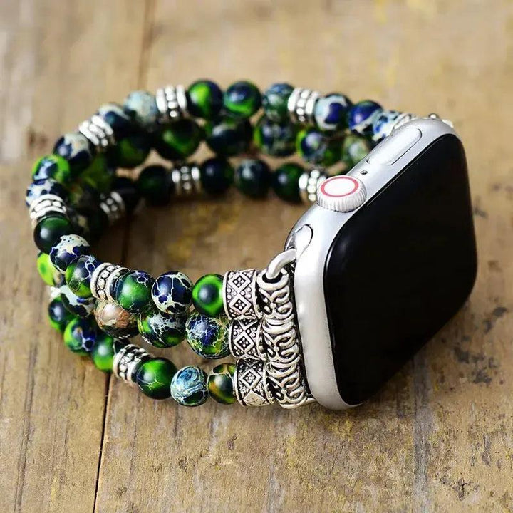 Crystal Destiny's Black Sand Jasper beaded Apple iWatch band with deep green, blue, and black tones, silver accents.