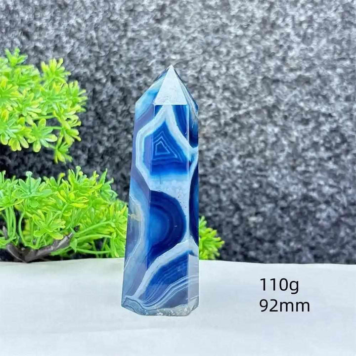 Polished blue agate hexagonal tower with soothing blue banding, perfect for Throat Chakra healing and calm focus.