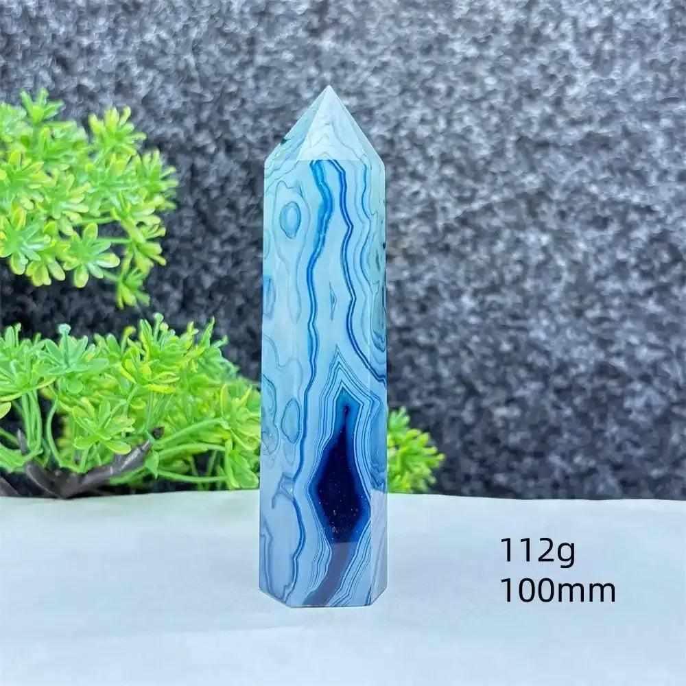 Polished blue agate hexagonal tower with soothing blue banding, perfect for Throat Chakra healing and calm focus.