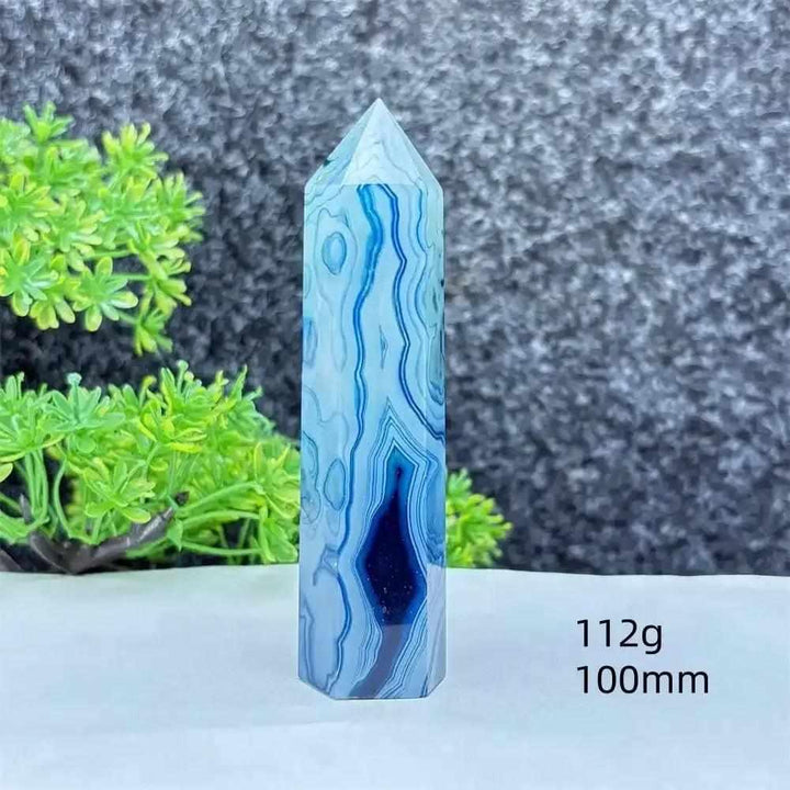 Polished blue agate hexagonal tower with soothing blue banding, perfect for Throat Chakra healing and calm focus.