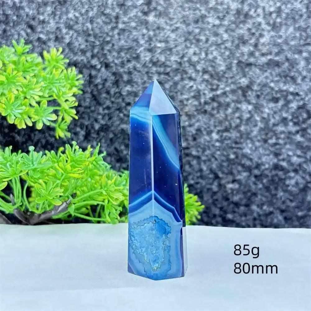 Polished blue agate hexagonal tower with soothing blue banding, perfect for Throat Chakra healing and calm communication.