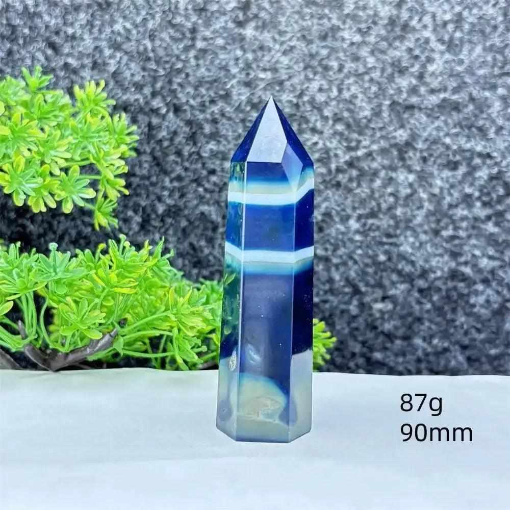 Polished blue agate hexagonal tower with gentle white banding, perfect for Throat Chakra healing and calm communication.