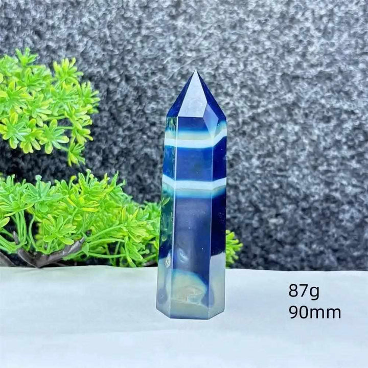 Polished blue agate hexagonal tower with gentle white banding, perfect for Throat Chakra healing and calm communication.