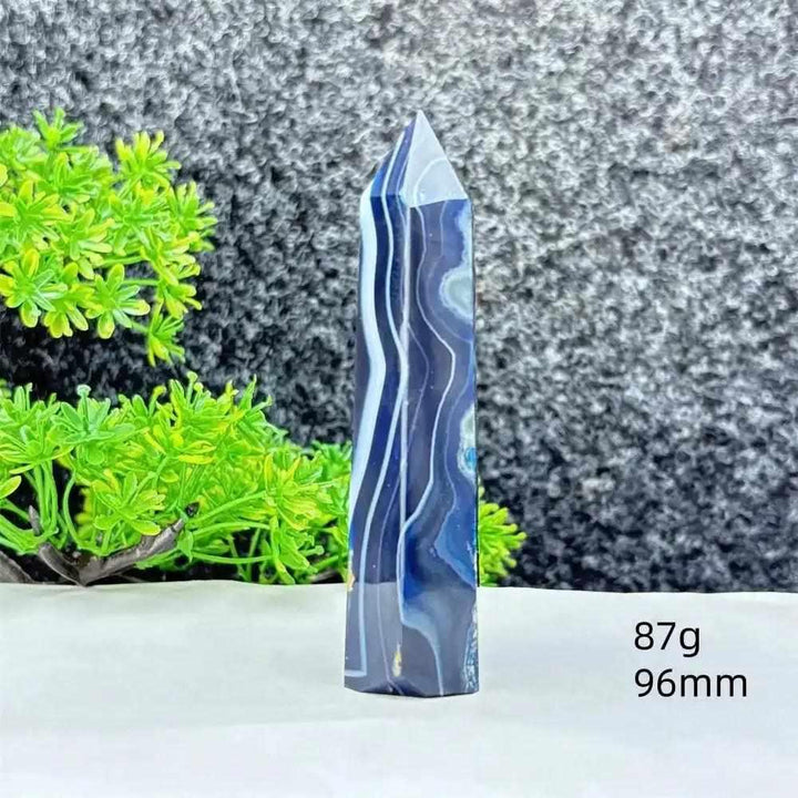 Polished blue agate hexagonal tower with soothing blue banding, perfect for Throat Chakra healing and calm communication.
