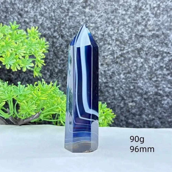 Polished blue agate hexagonal tower with soothing blue banding, perfect for Throat Chakra healing and calm focus.