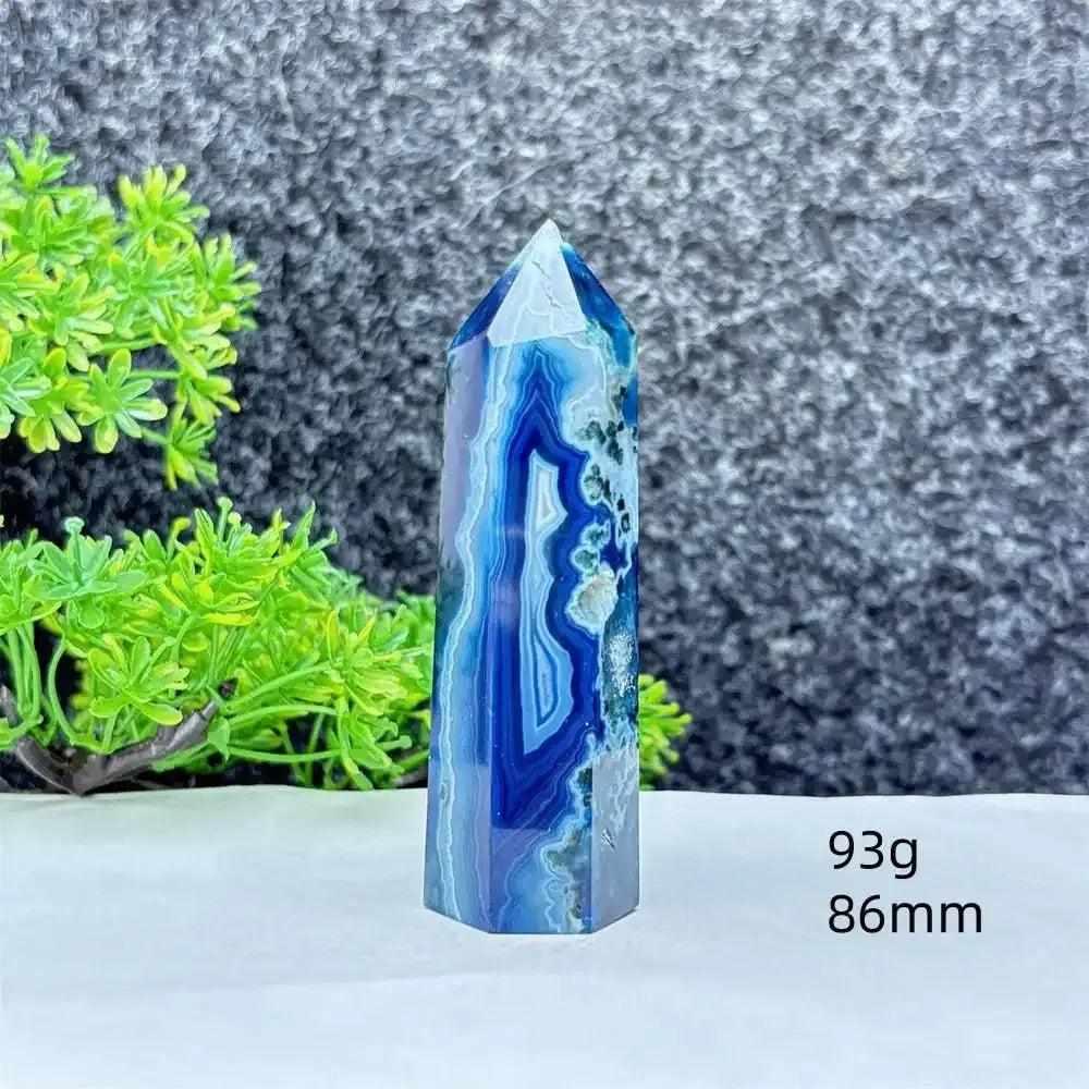 Polished blue agate hexagonal tower with soothing blue banding, perfect for Throat Chakra healing and calm focus.