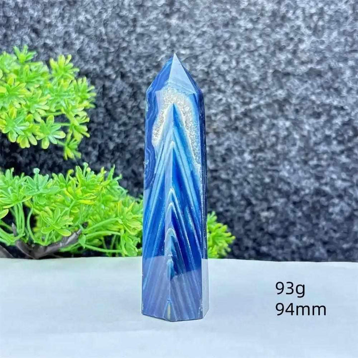 Polished blue agate hexagonal tower with soothing blue banding, perfect for Throat Chakra healing and calm focus.