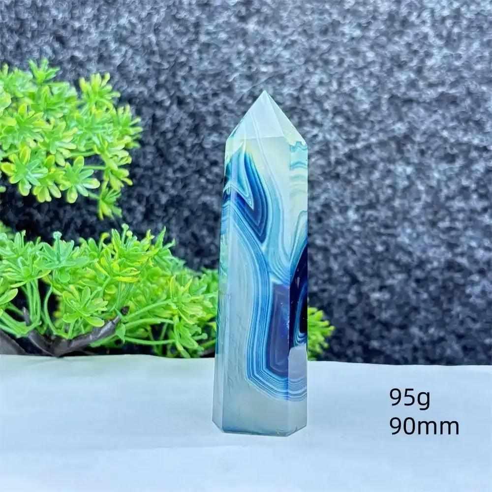 Polished blue agate hexagonal tower with soothing blue banding, perfect for Throat Chakra healing and calm focus.