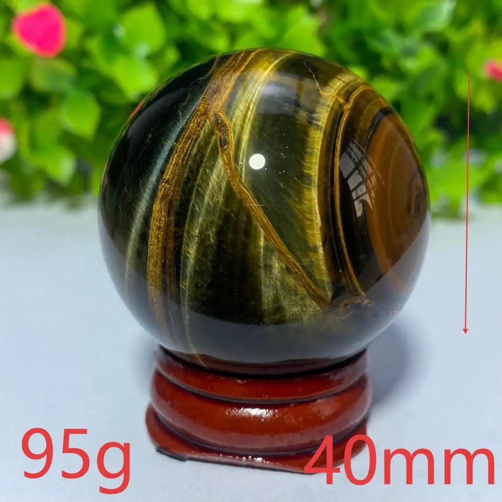 40mm natural blue and yellow Tiger Eye crystal ball, a polished gemstone sphere perfect for Reiki healing and decor.