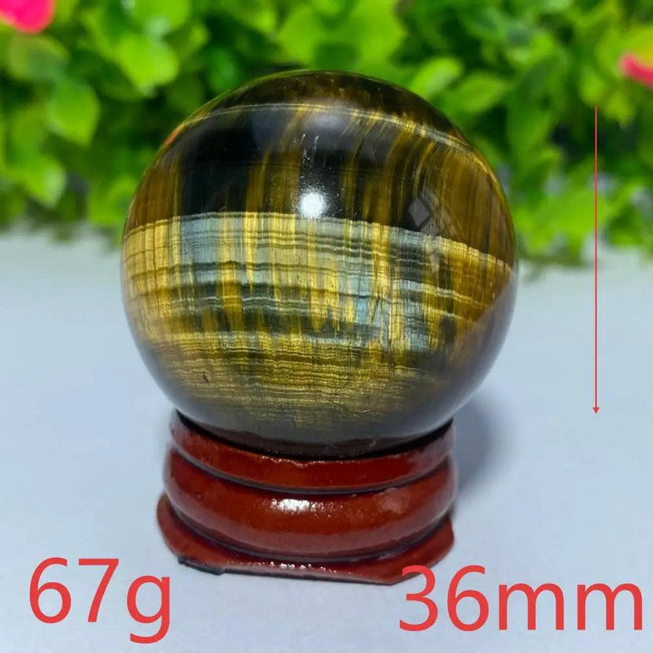 36mm natural blue and yellow Tiger Eye crystal ball for Reiki healing, meditation, and spiritual home decor.