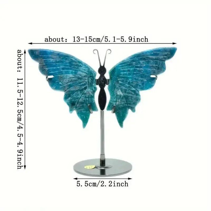 Vivid electric teal-blue Apatite butterfly wings crystal carving on a stand, symbolizing transformation and clarity.