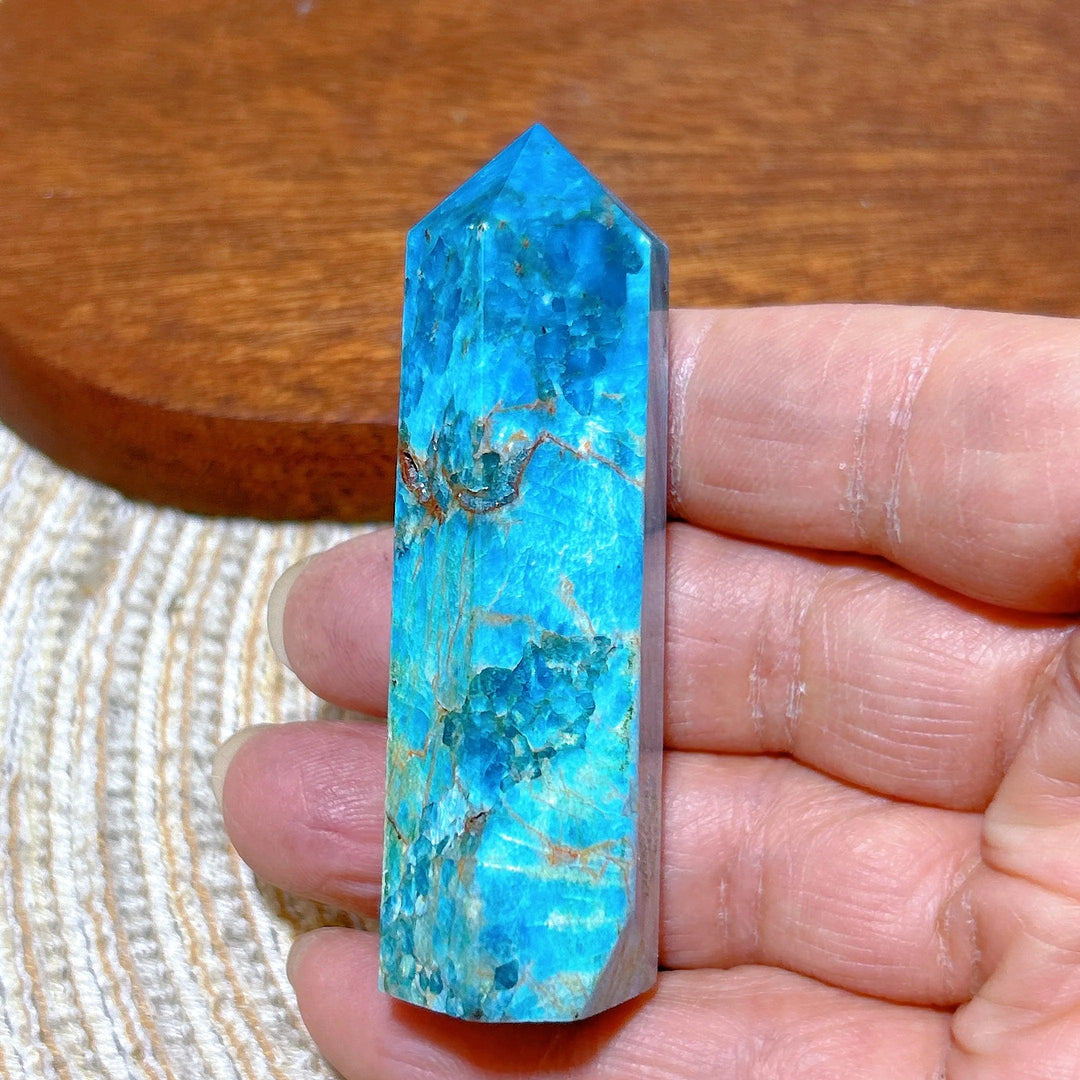 Natural blue flashy Apatite crystal tower, a high-quality healing gemstone point for Reiki and home decor.