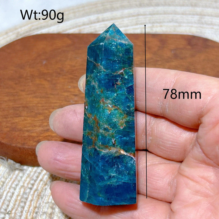 78mm flashy blue Apatite crystal tower, a 90g natural healing gemstone point for Reiki, meditation, and home decor.