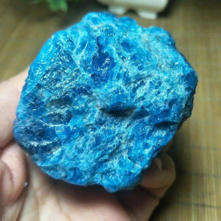 Raw Blue Apatite crystal specimen with vibrant teal to cobalt glassy fractures, perfect for focus and creativity.