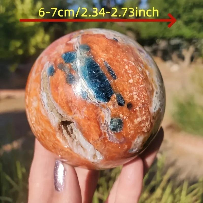 6-7cm Blue Apatite Sunstone Crystal Sphere with orange and blue hues for energy and confidence.