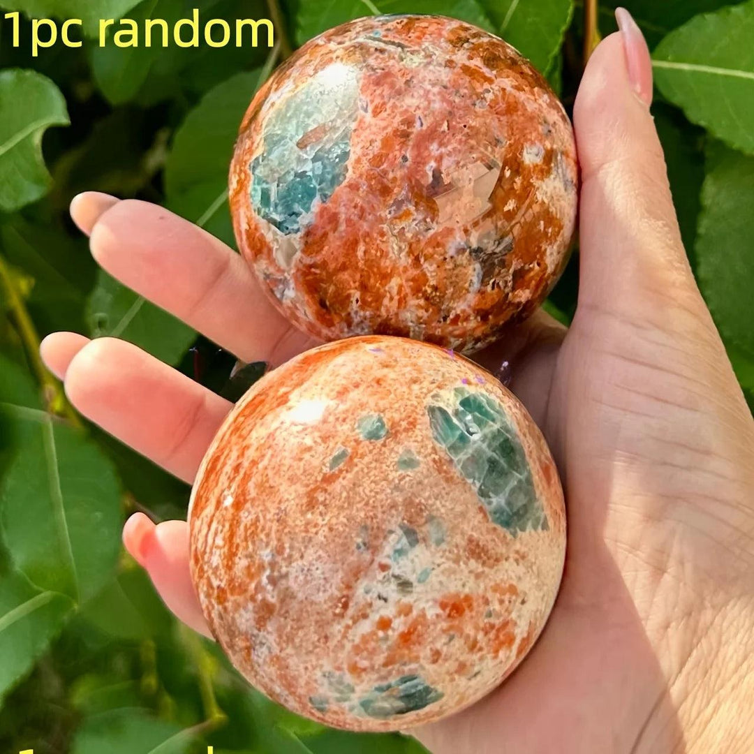 Polished Blue Apatite Sunstone Crystal Spheres with vibrant orange and blue tones for vitality.