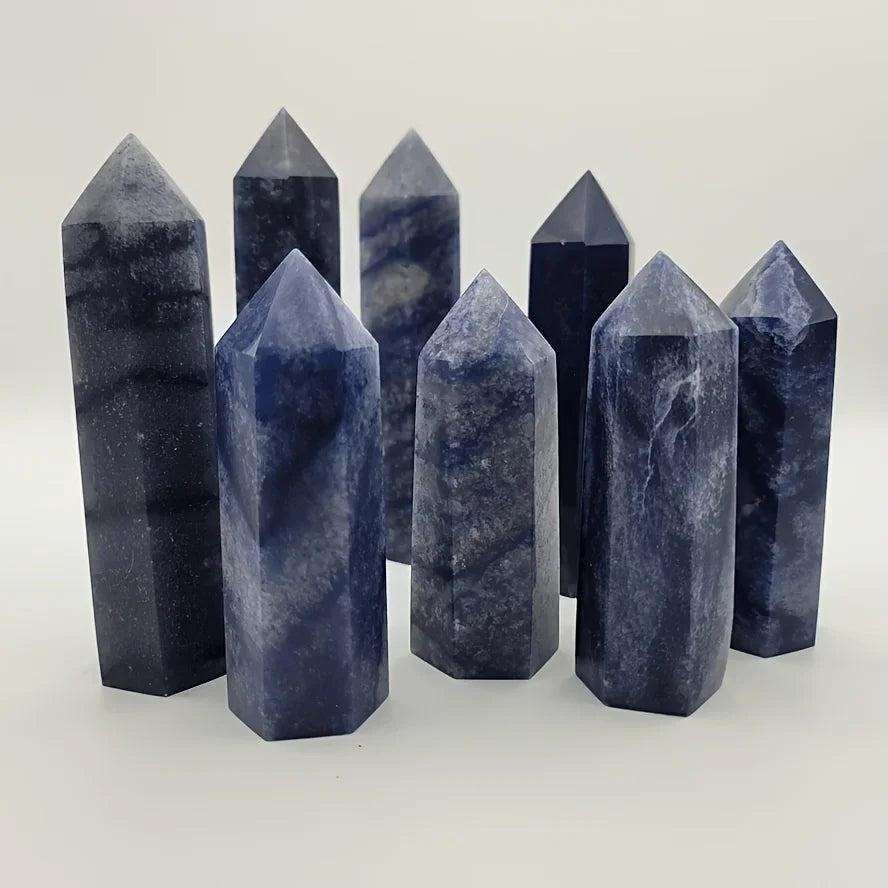 Polished Blue Aventurine obelisk towers with natural white and dark blue mineral banding.