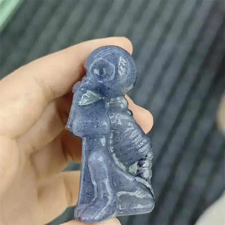 60mm Blue Aventurine skeleton carving with polished blue-gray stone, detailed ribs, and Throat Chakra energy.
