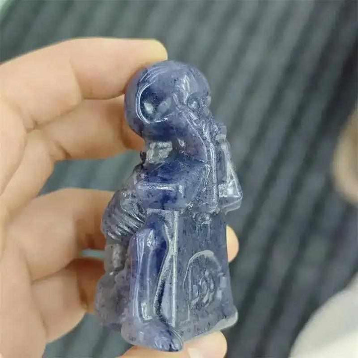 60mm Blue Aventurine skeleton carving with polished blue-gray stone, detailed ribcage, and Throat Chakra energy.