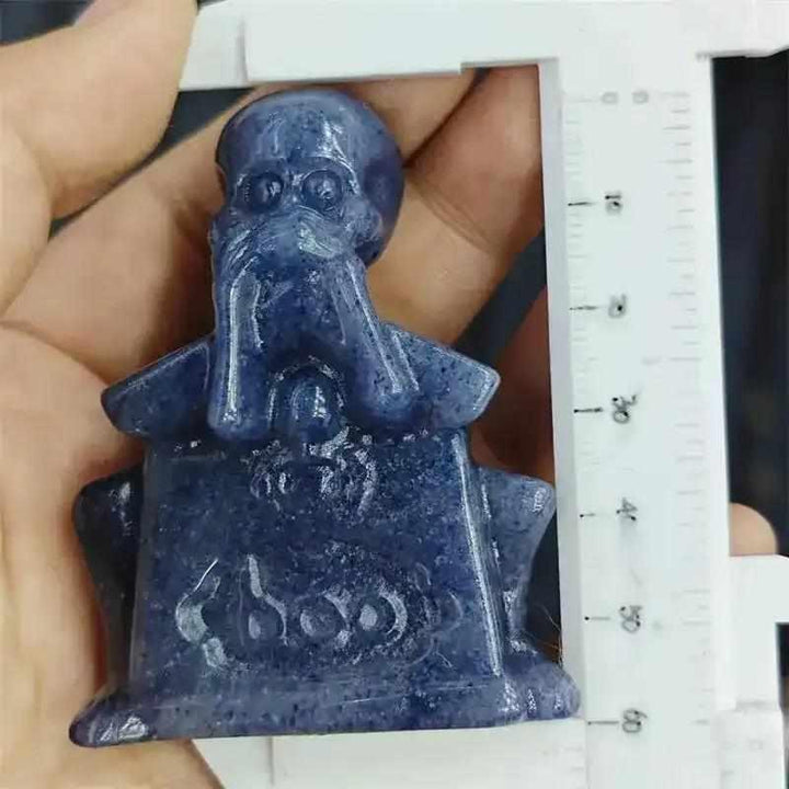 60mm Blue Aventurine skeleton carving with a polished blue-gray finish, perfect for Throat Chakra expression.