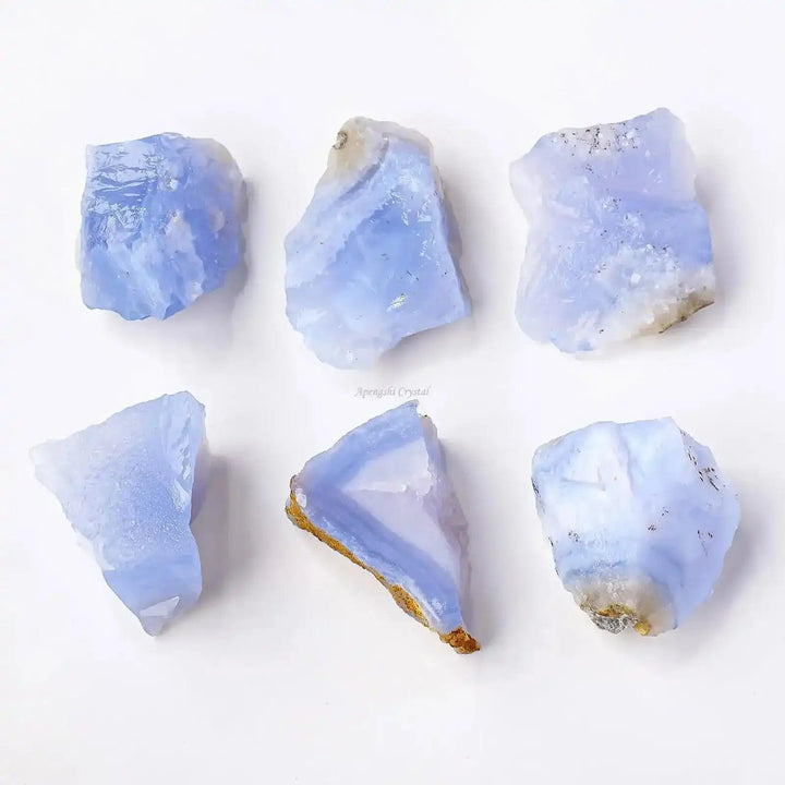 Raw blue banded agate chunks with white chalcedony layers, perfect for Throat chakra calm and mindful focus.