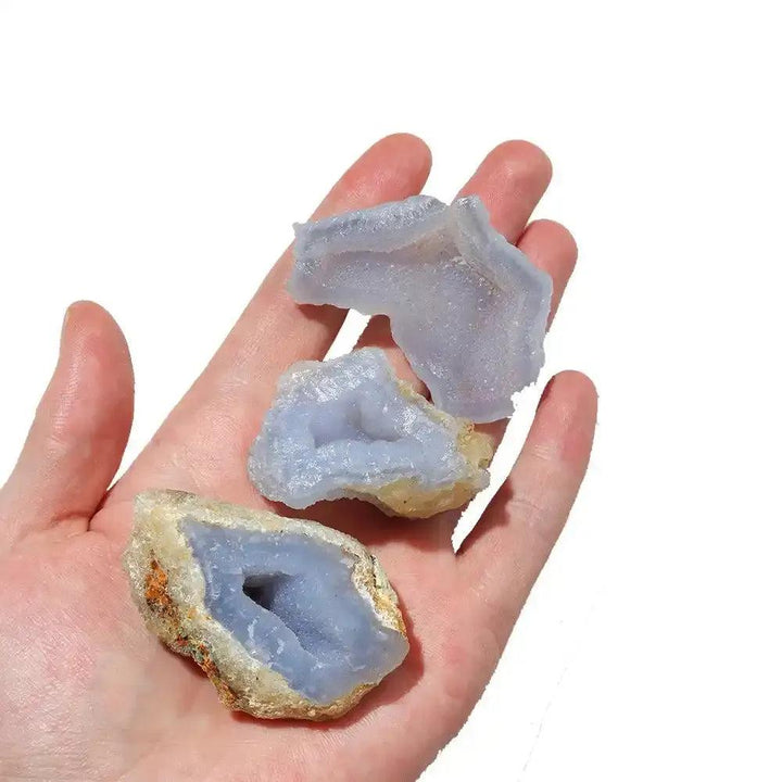 Raw Blue Banded Agate chunks with soothing blue chalcedony, perfect for Throat chakra healing and calm communication.