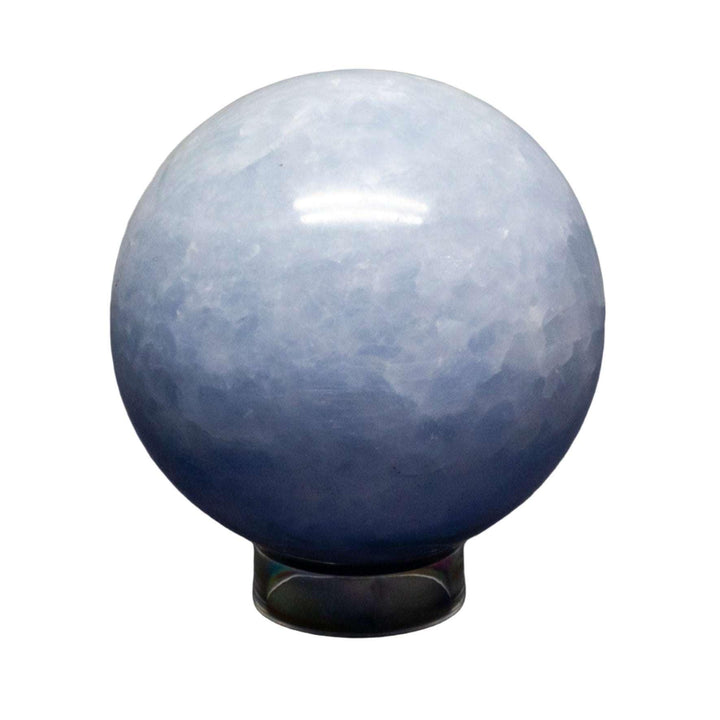 Calming Blue Calcite Sphere, a polished crystal ball with hazy blue hues, promoting tranquility.