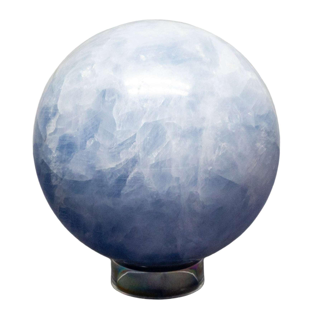 Calming Blue Calcite Sphere, 72-93mm, with hazy blue hues, polished to maximize translucency and color depth.