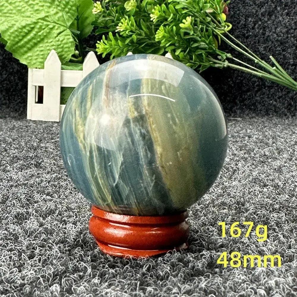 Stunning Blue Calcite Crystal Sphere, 48mm, 167g, with serene blue and aqua tones for peace and healing.