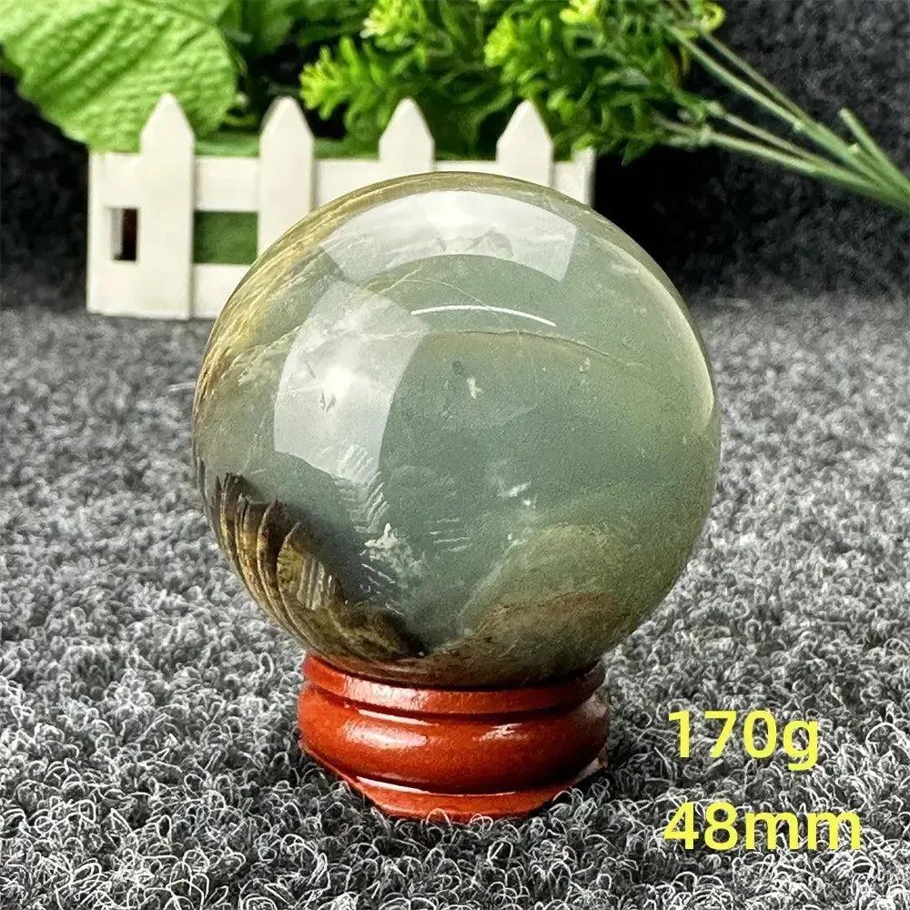 Stunning Blue Calcite Crystal Sphere, 48mm, 170g. Serene blue-green tones for peace and emotional healing.