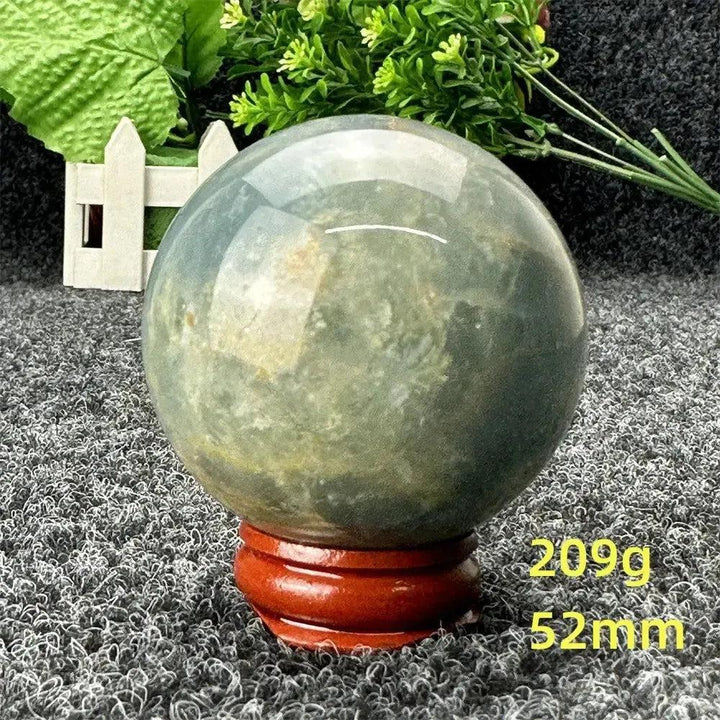 Stunning Blue Calcite Crystal Sphere, 52mm, 209g, showcasing serene blue tones for peace and emotional healing.
