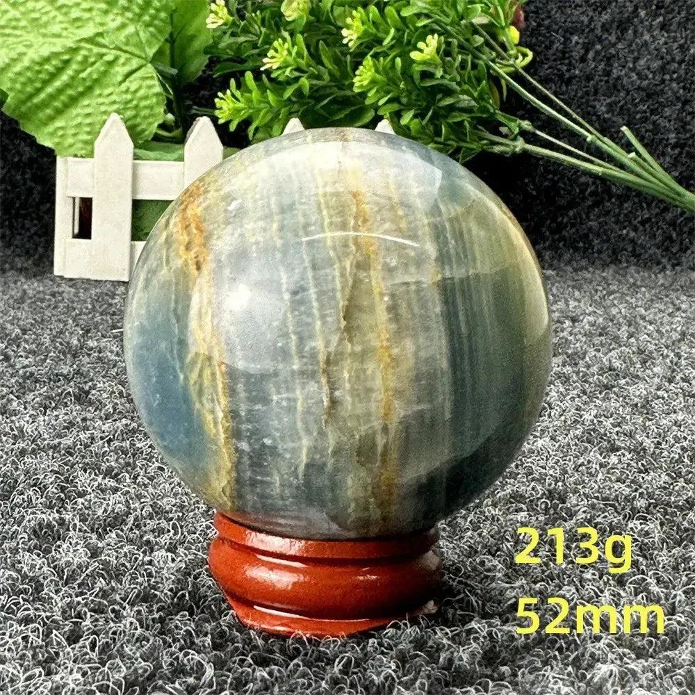 Stunning Blue Calcite Crystal Sphere, 52mm, 213g, with serene blue tones for peace and emotional healing.