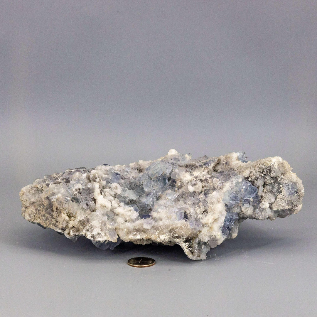 Blue Fluorite XL Sugar Cube Cluster, a rare, museum-quality specimen with shifting blue hues and cubic formations.