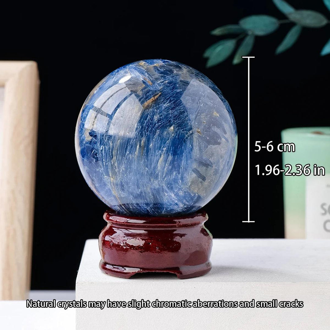 Polished 50-60mm Blue Kyanite crystal sphere with striking striated blue blades for energetic balance and alignment.
