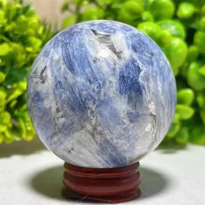Blue Kyanite crystal sphere with striking blue and white patterns, perfect for Throat Chakra reflection and mindfulness.