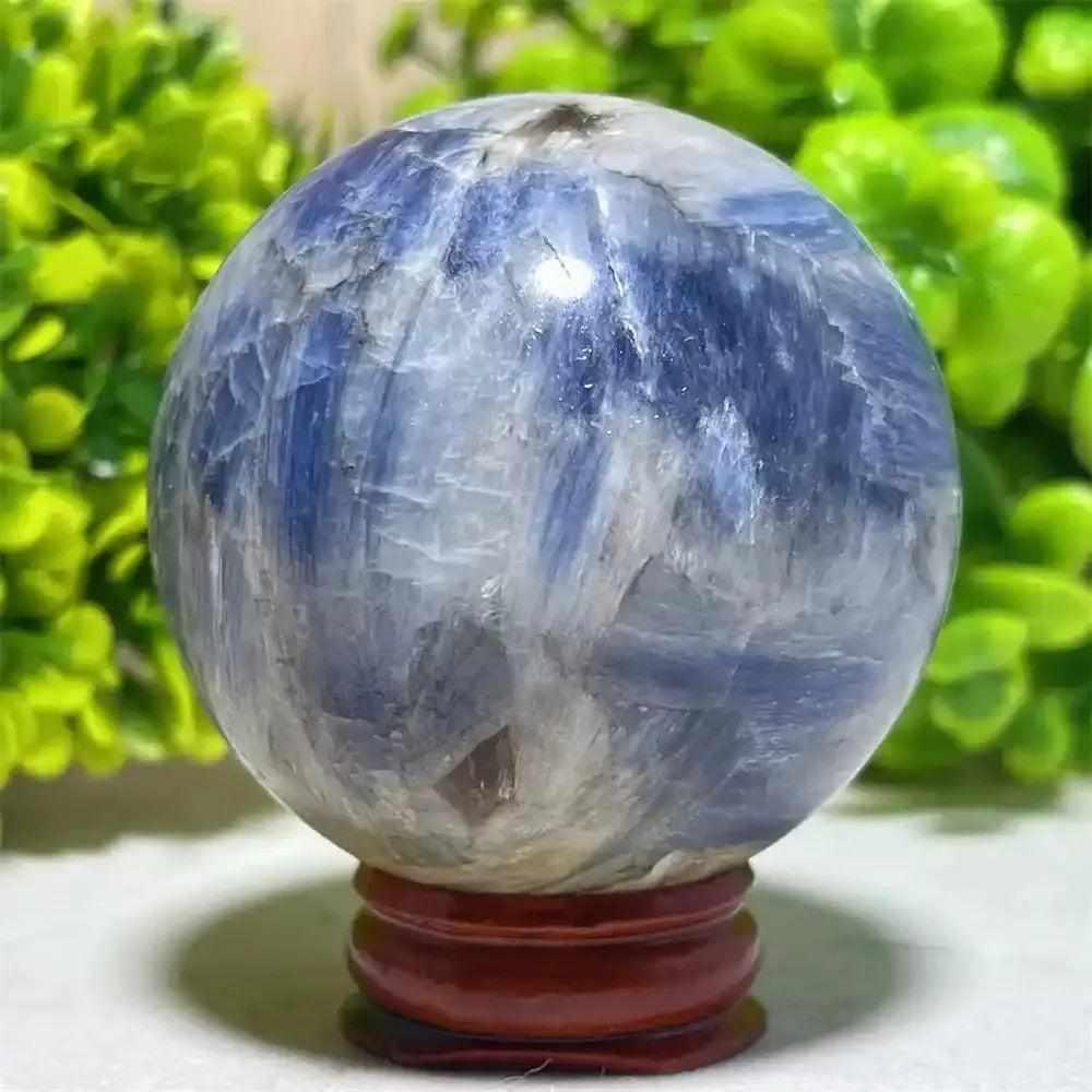 Polished Blue Kyanite crystal sphere with deep blue and white patterns, perfect for Throat Chakra mindful reflection.