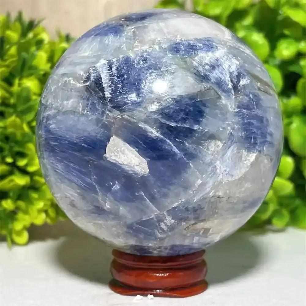 Polished Blue Kyanite crystal sphere with deep blue and white mineral patterns for mindful Throat Chakra reflection.