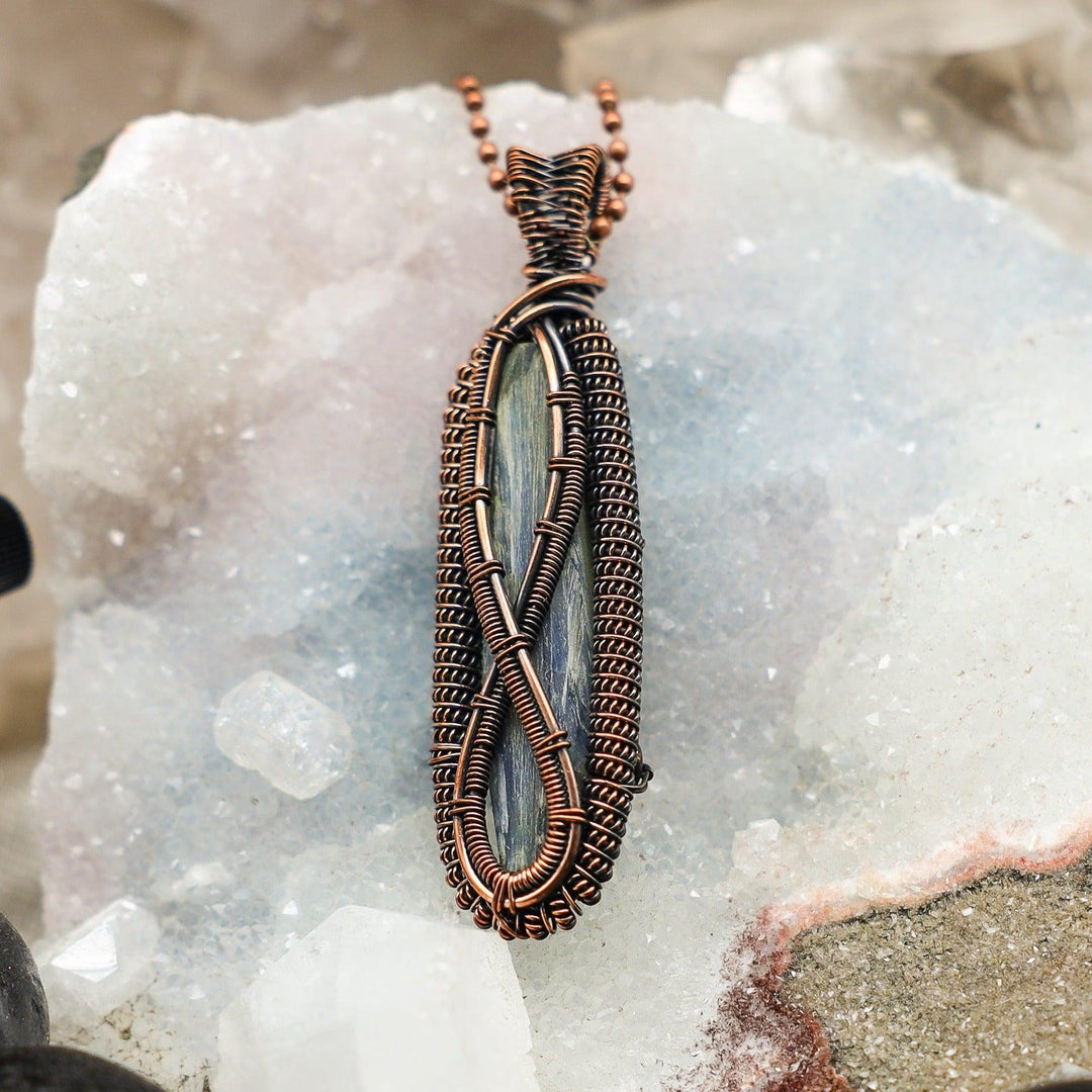 Blue Kyanite Wire Wrap Pendant, 3.05-inch, handcrafted with healing copper wire showcasing natural blade formation.