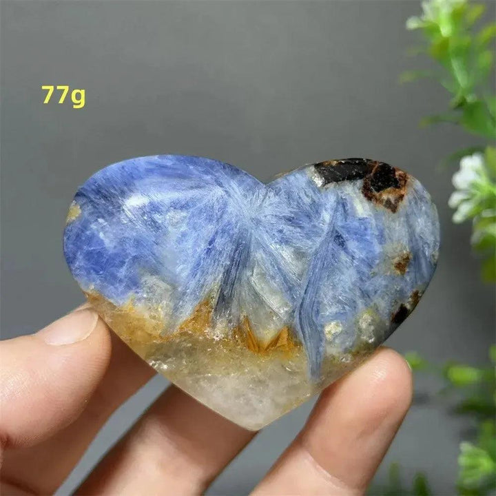 Blue Apatite Crystal Heart: Vibrant electric blue, heart-shaped crystal with natural inclusions, 77g.