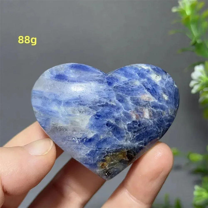 Captivating Blue Apatite Crystal Heart, 88g, with vibrant electric blue hues, smooth polished finish.