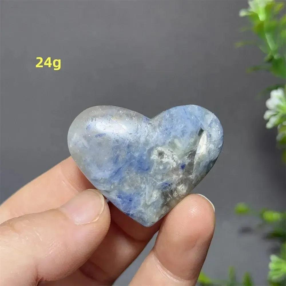 Blue Apatite Crystal Heart: Smooth, polished heart-shaped crystal with vibrant electric blue hues, weighing 24g.