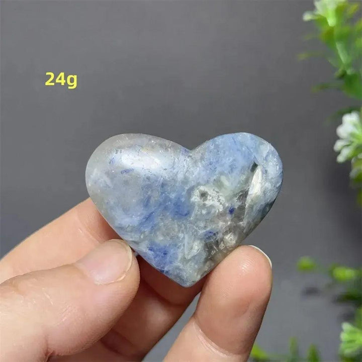 Blue Apatite Crystal Heart: Smooth, polished heart-shaped crystal with vibrant electric blue hues, weighing 24g.