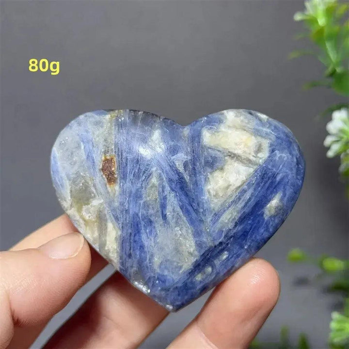 Blue Apatite Crystal Heart, 80g. Vibrant electric blue heart-shaped crystal with natural inclusions, polished smooth.